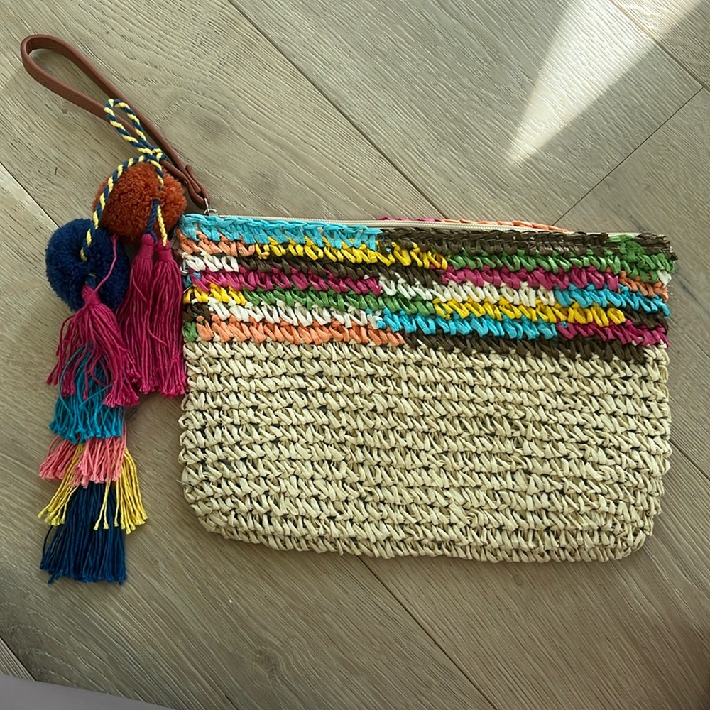 Woven clutch with bright accents